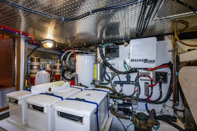  Yacht Photos Pics Engine room of 2000 Symbol 42 Classic Trawler with equipment and wiring.