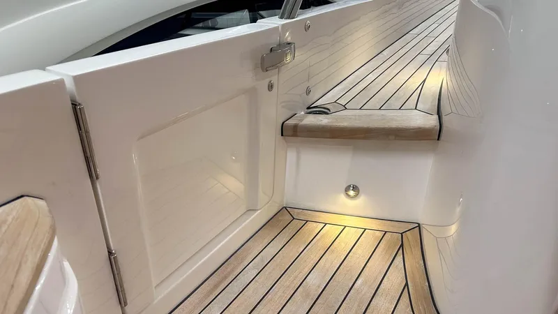 F55163 Yacht Photos Pics Luxurious Princess F55 yacht deck with elegant wood finish, 2023 model.