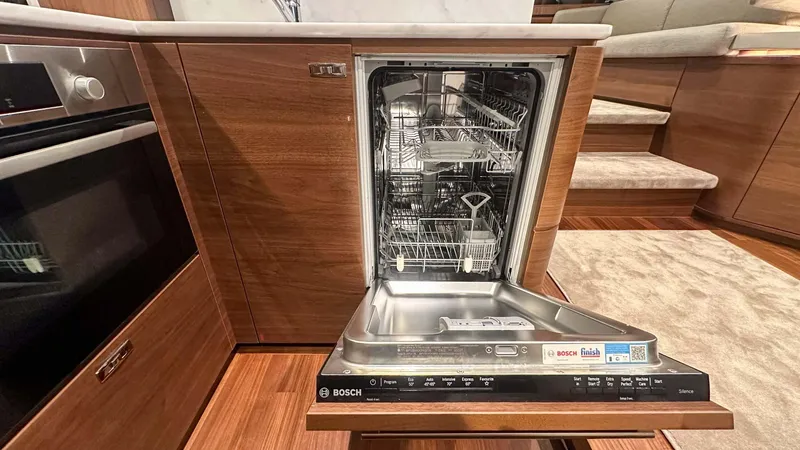 F55163 Yacht Photos Pics Modern Bosch dishwasher in 2023 Princess F55 yacht kitchen interior.