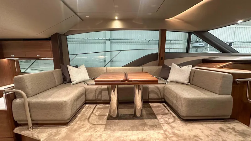 F55163 Yacht Photos Pics Luxurious interior of 2023 Princess F55 yacht with elegant seating and modern design.