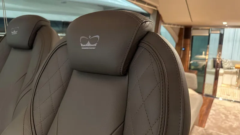 F55163 Yacht Photos Pics Luxurious leather seats in the 2023 Princess F55 yacht interior.