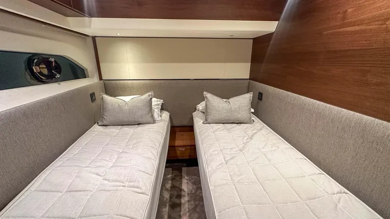 F55163 Yacht Photos Pics Luxurious twin cabin in 2023 Princess F55 yacht with modern decor.