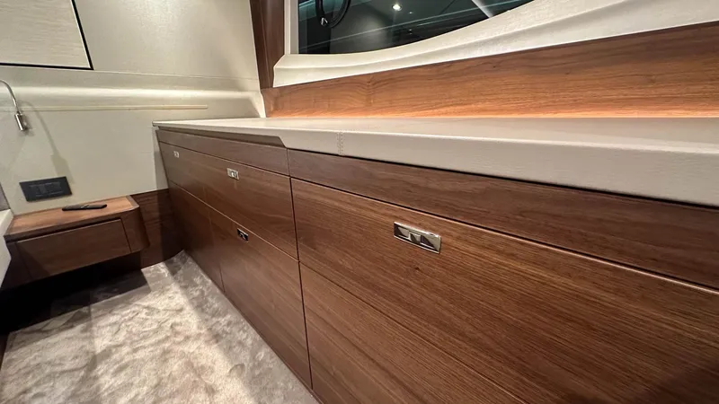 F55163 Yacht Photos Pics Luxurious wood cabinetry in 2023 Princess F55 yacht interior.