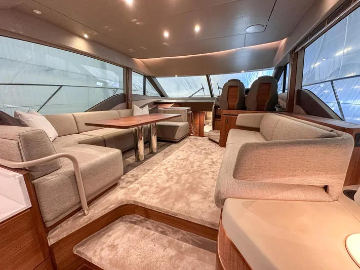 F55163 Yacht Photos Pics Luxurious interior of 2023 Princess F55 yacht with elegant seating and modern design.
