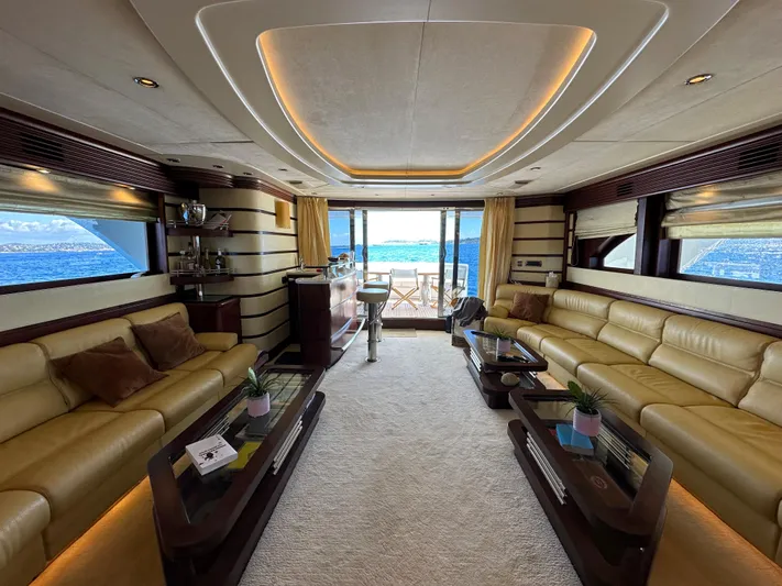 Lady Moh Yacht Photos Pics Luxurious interior of a 2002 Bugari 95 yacht with ocean view.