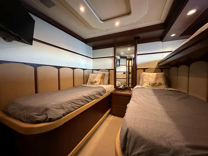 Lady Moh Yacht Photos Pics Luxurious twin bedroom in a 2002 Bugari 95 yacht with modern decor.