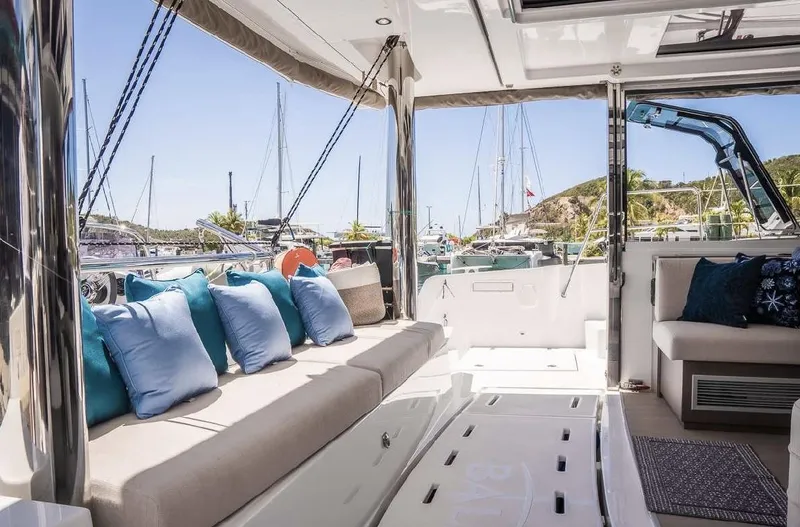  Yacht Photos Pics Luxurious 2021 Bali 4.8 yacht interior with plush seating and marina view.