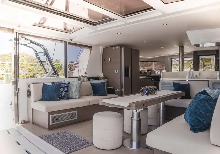  Yacht Photos Pics Luxurious interior of 2021 Bali 4.8 yacht with modern seating and decor.