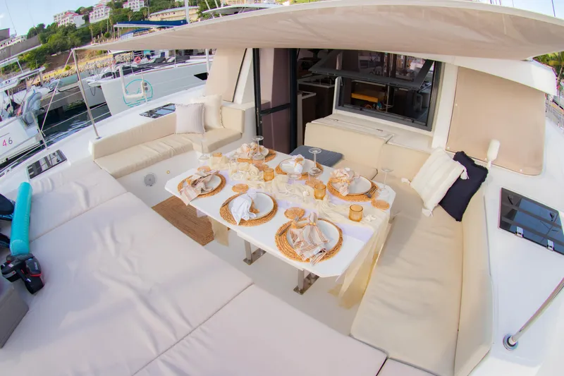  Yacht Photos Pics Luxurious Bali 4.8 yacht dining area, elegantly set table, 2021 model.
