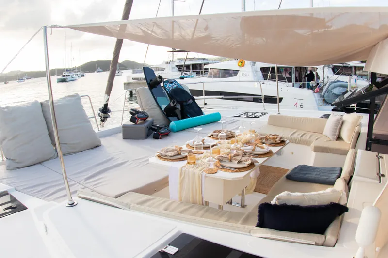  Yacht Photos Pics Luxurious Bali 4.8 yacht deck with elegant dining setup, 2021 model.