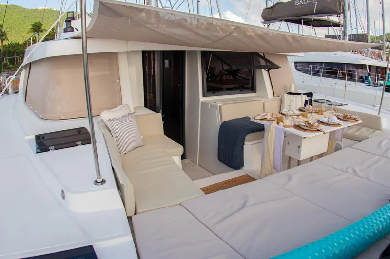  Yacht Photos Pics Luxurious Bali 4.8 yacht deck with elegant outdoor dining setup, 2021 model.