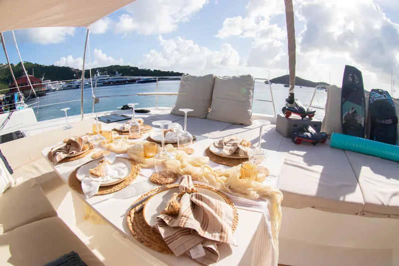  Yacht Photos Pics Luxurious Bali 4.8 yacht deck with elegant dining setup, 2021 model.