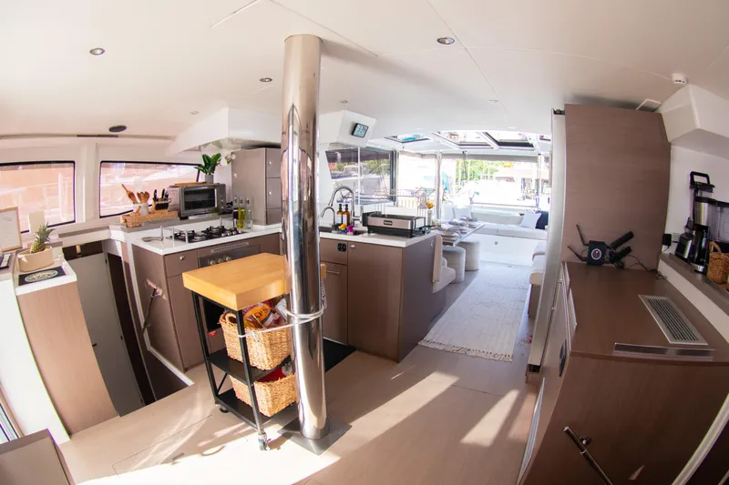  Yacht Photos Pics Spacious interior of 2021 Bali 4.8 yacht with modern kitchen and lounge area.