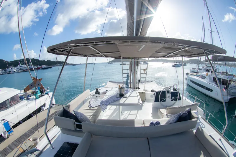  Yacht Photos Pics Luxurious 2021 Bali 4.8 catamaran docked in a sunny marina.
