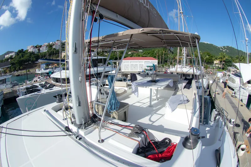  Yacht Photos Pics 2021 Bali 4.8 catamaran docked at marina under clear blue sky.