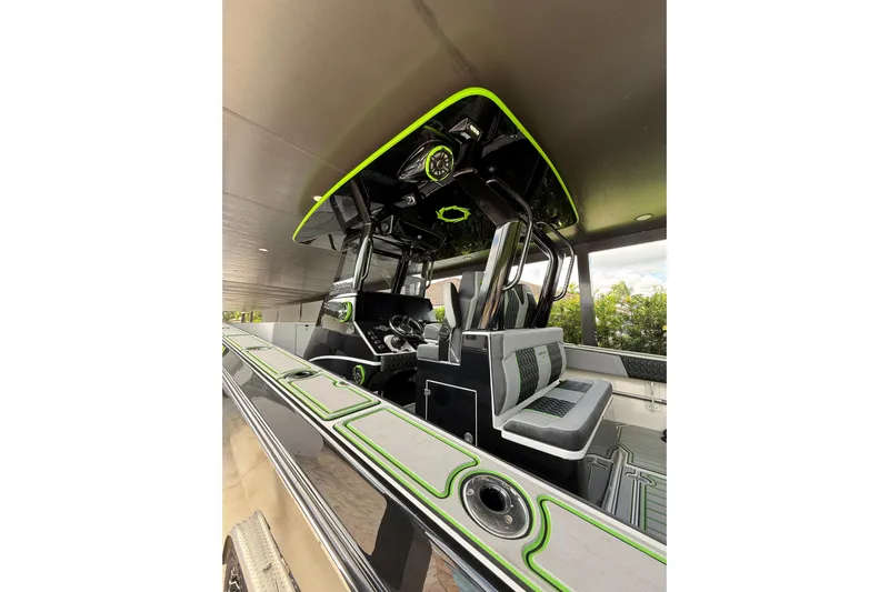  Yacht Photos Pics 2006 Fountain 38 CC Tournament Edition boat interior with modern seating and sleek design.