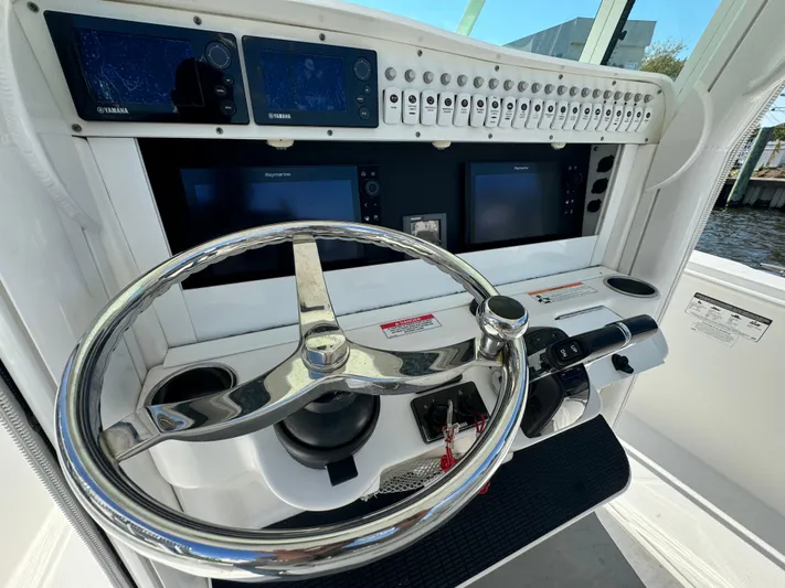  Yacht Photos Pics 2011 Everglades 325 Center Console helm with advanced navigation and control systems.