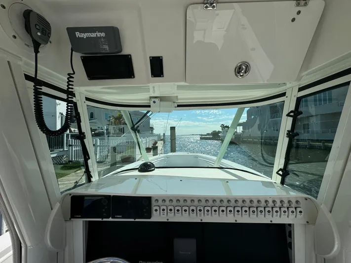  Yacht Photos Pics Interior view of 2011 Everglades 325 Center Console boat with Raymarine equipment.