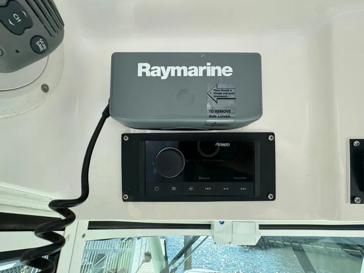  Yacht Photos Pics Raymarine and Fusion equipment on 2011 Everglades 325 Center Console boat dashboard.