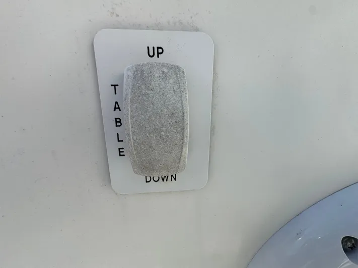  Yacht Photos Pics Switch for table adjustment on 2011 Everglades 325 Center Console boat.