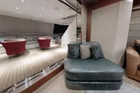 Luxurious interior of 2018 Benetti 95 Delfino yacht with elegant seating and dining area.