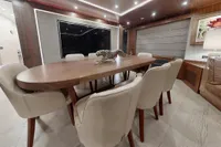 Luxurious interior of 2018 Benetti 95 Delfino yacht with elegant dining area.