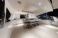 Luxurious 2018 Benetti 95 Delfino yacht deck with elegant seating and modern lighting.