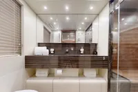 Luxurious bathroom interior of 2018 Benetti 95 Delfino yacht with modern fixtures and elegant design.