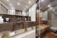 Luxurious bathroom in 2018 Benetti 95 Delfino yacht with modern fixtures and elegant design.