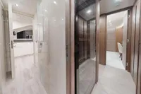 Luxurious interior of 2018 Benetti 95 Delfino yacht, featuring elegant wood finishes and modern design.