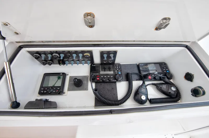  Yacht Photos Pics 2001 Viking 55 Convertible boat control panel with navigation and communication equipment.