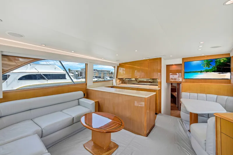  Yacht Photos Pics Luxurious interior of a 2001 Viking 55 Convertible yacht with modern furnishings.