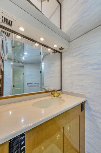  Yacht Photos Pics 2001 Viking 55 Convertible yacht bathroom with vanity and mirror