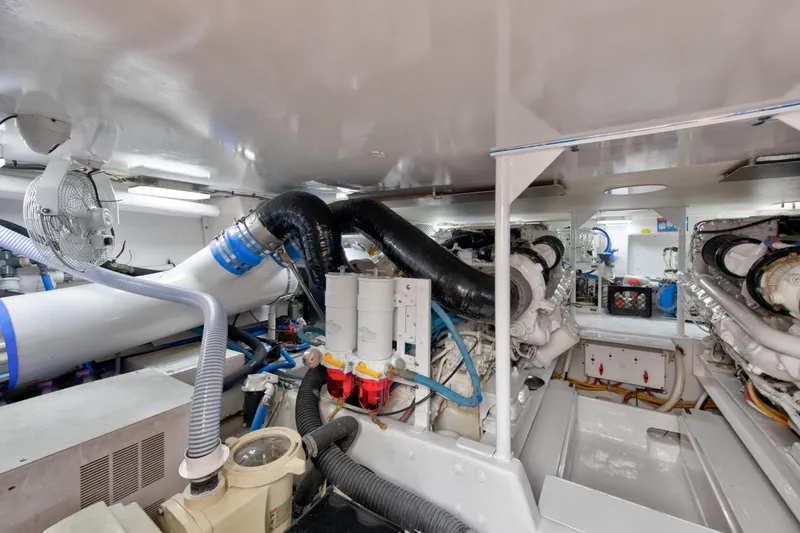  Yacht Photos Pics Engine room of a 2001 Viking 55 Convertible yacht with visible machinery and components.