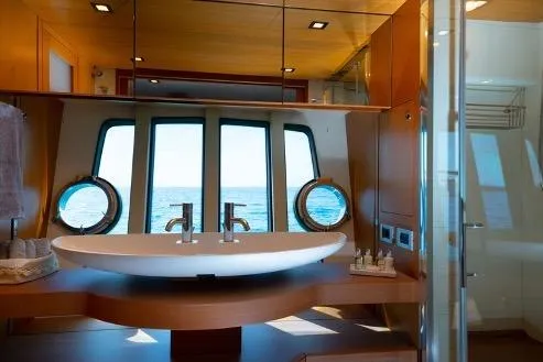  Yacht Photos Pics Luxurious bathroom on 2008 Ferretti Yachts 780 with ocean view and modern fixtures.