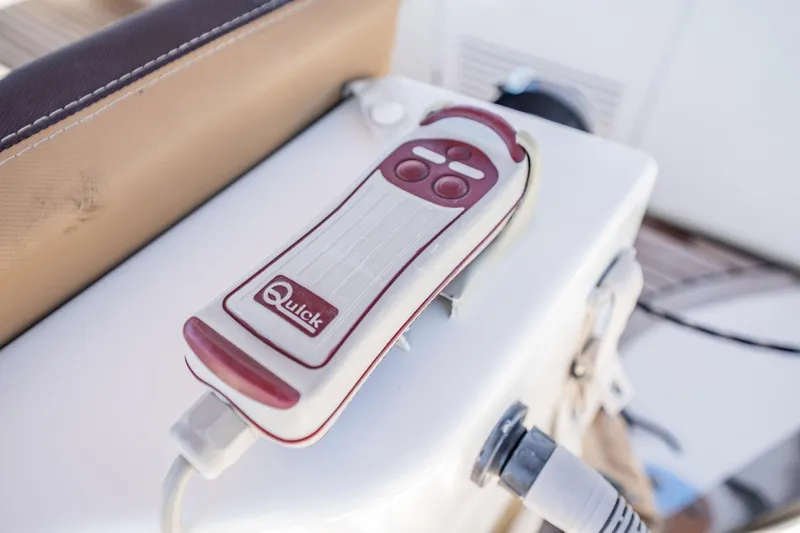 Wanderer Yacht Photos Pics Remote control on Beneteau Swift Trawler 44, 2016 model, with "Quick" branding.