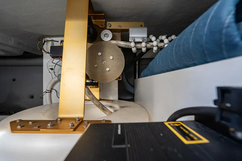 Wanderer Yacht Photos Pics Engine room of 2016 Beneteau Swift Trawler 44, showcasing mechanical components and wiring.