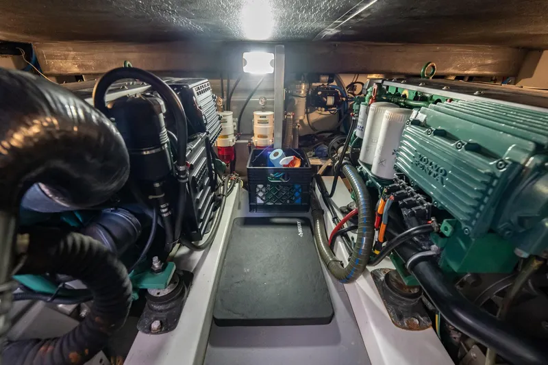 Wanderer Yacht Photos Pics Engine room of 2016 Beneteau Swift Trawler 44, showcasing mechanical components and systems.
