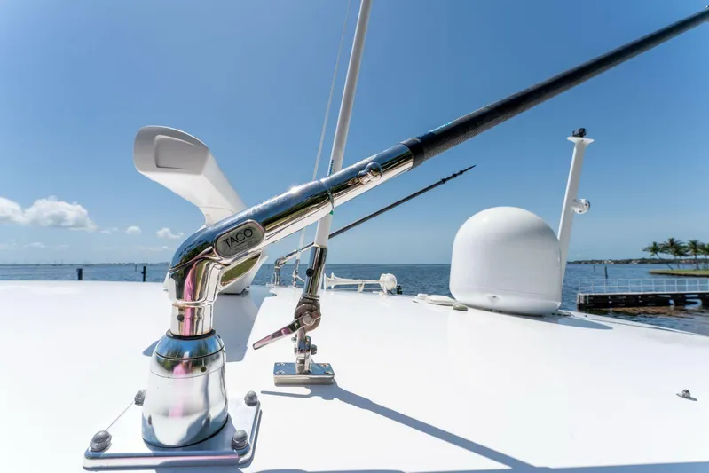  Yacht Photos Pics 2021 Intrepid 407 Panacea boat deck with antenna, ocean view, and clear blue sky.