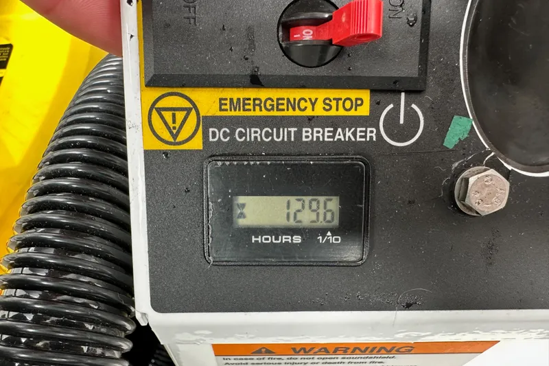  Yacht Photos Pics Close-up of Jeanneau NC11 2015 DC circuit breaker with emergency stop and hour meter.