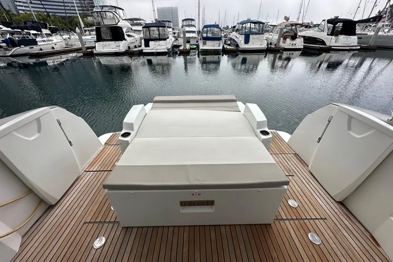  Yacht Photos Pics 2015 Jeanneau NC11 yacht with spacious deck at marina.