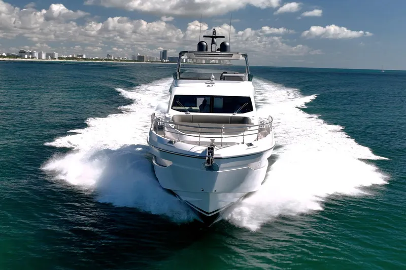 Transcendence Yacht Photos Pics Azimut 78 Flybridge 2020 yacht cruising on open water under a clear sky.