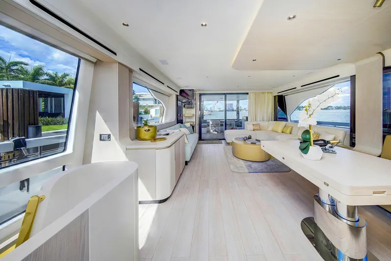 Transcendence Yacht Photos Pics Luxurious interior of 2020 Azimut 78 Flybridge yacht with modern decor and waterfront view.