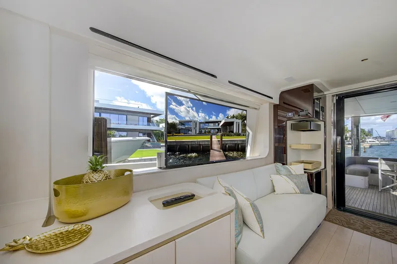 Transcendence Yacht Photos Pics Luxurious interior of 2020 Azimut 78 Flybridge yacht with modern decor and waterfront view.