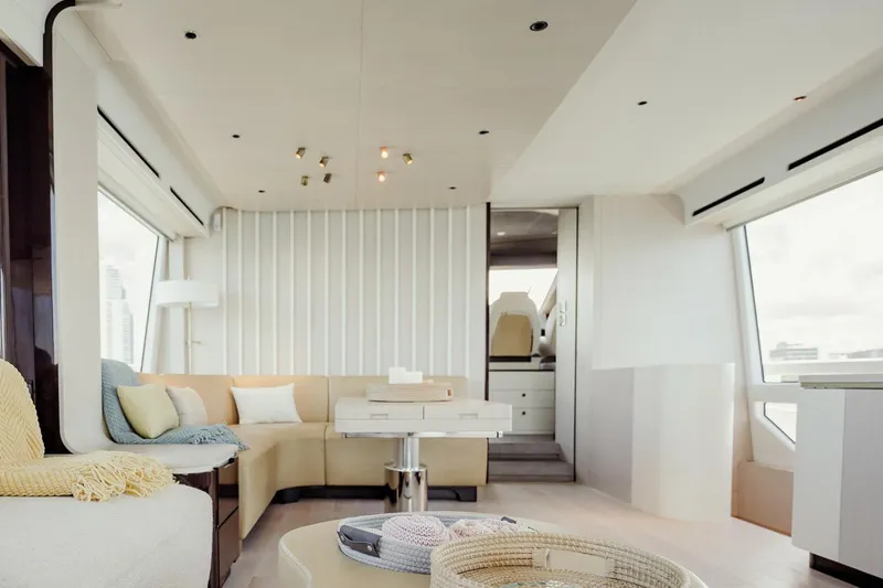 Transcendence Yacht Photos Pics Luxurious interior of 2020 Azimut 78 Flybridge yacht with modern seating and decor.