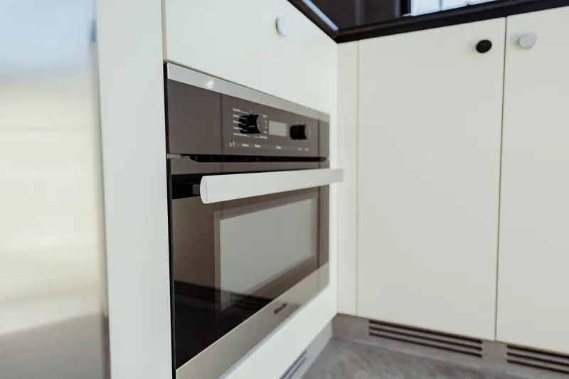 Transcendence Yacht Photos Pics Modern kitchen oven in Azimut 78 Flybridge yacht, 2020 model.