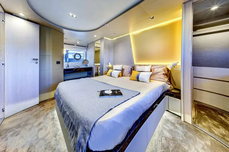Transcendence Yacht Photos Pics Luxurious bedroom interior of 2020 Azimut 78 Flybridge yacht with modern design and ambient lighting.