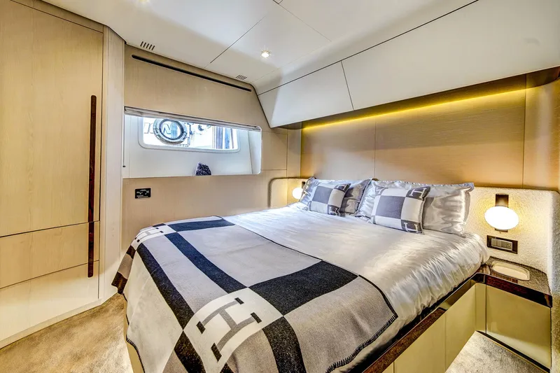 Transcendence Yacht Photos Pics Luxurious bedroom interior of 2020 Azimut 78 Flybridge yacht with modern design and cozy bedding.