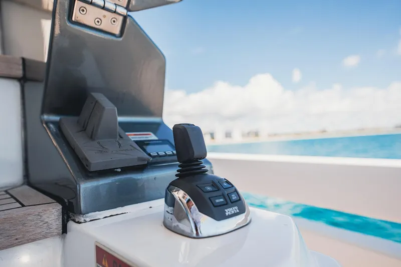 Transcendence Yacht Photos Pics Control panel of a 2020 Azimut 78 Flybridge yacht with ocean view.