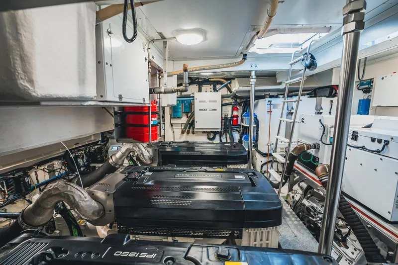 Transcendence Yacht Photos Pics Engine room of 2020 Azimut 78 Flybridge yacht, showcasing advanced machinery and equipment.